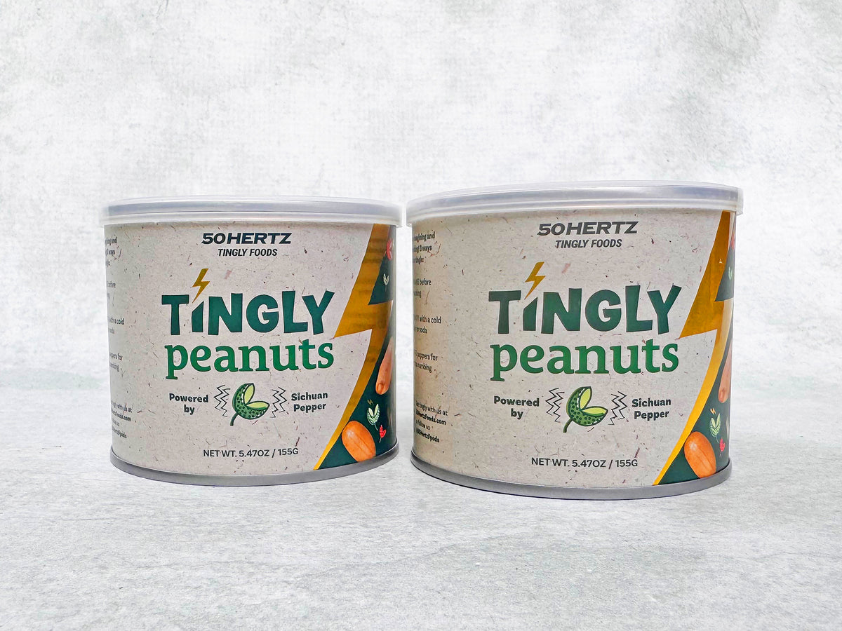 Two cans of 50 Hertz Tingly Peanuts