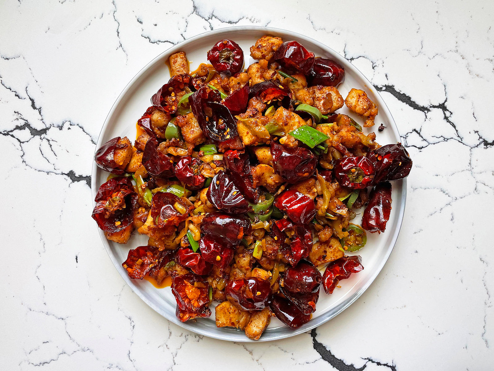 Chongqing chicken with chilies on a plate