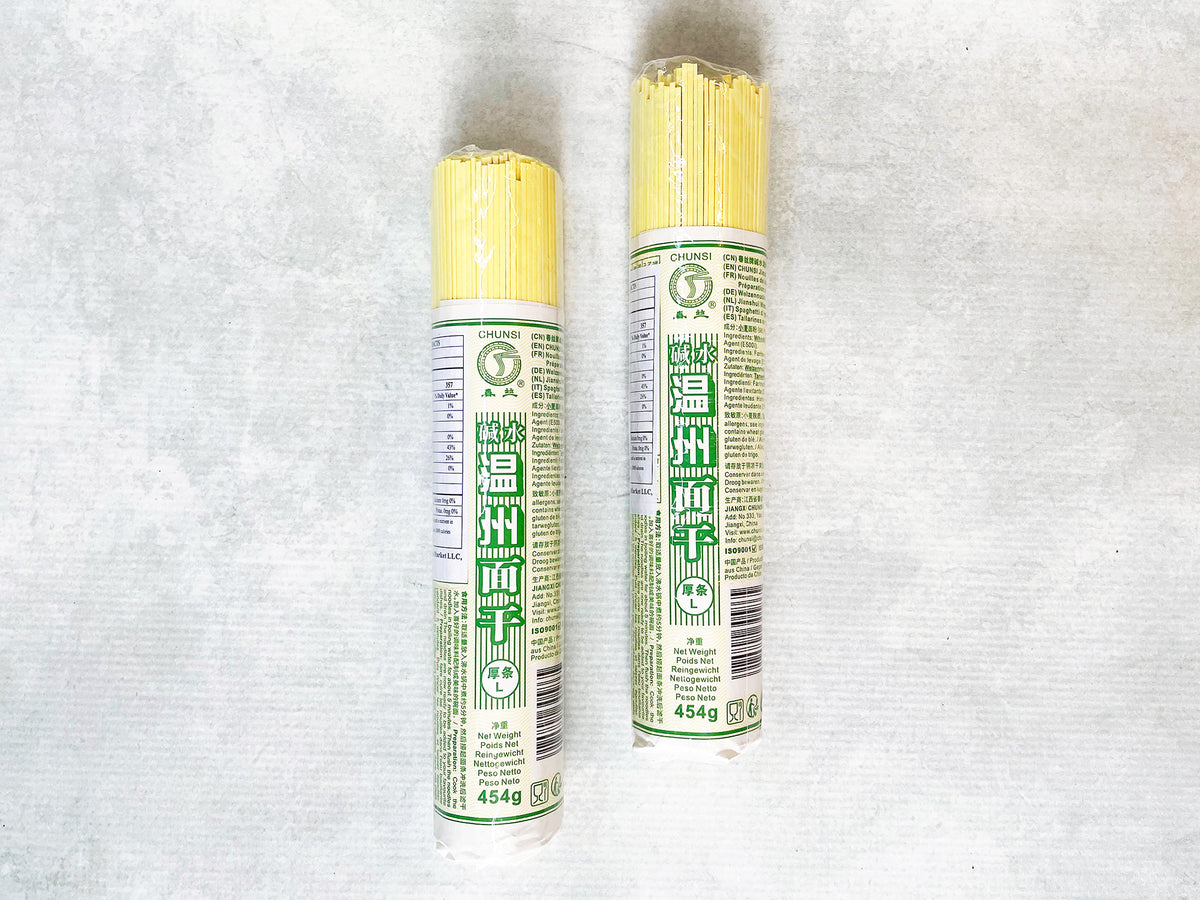 a set of 2 rolls of yellow alkaline wheat noodles, each weighing 1 pound