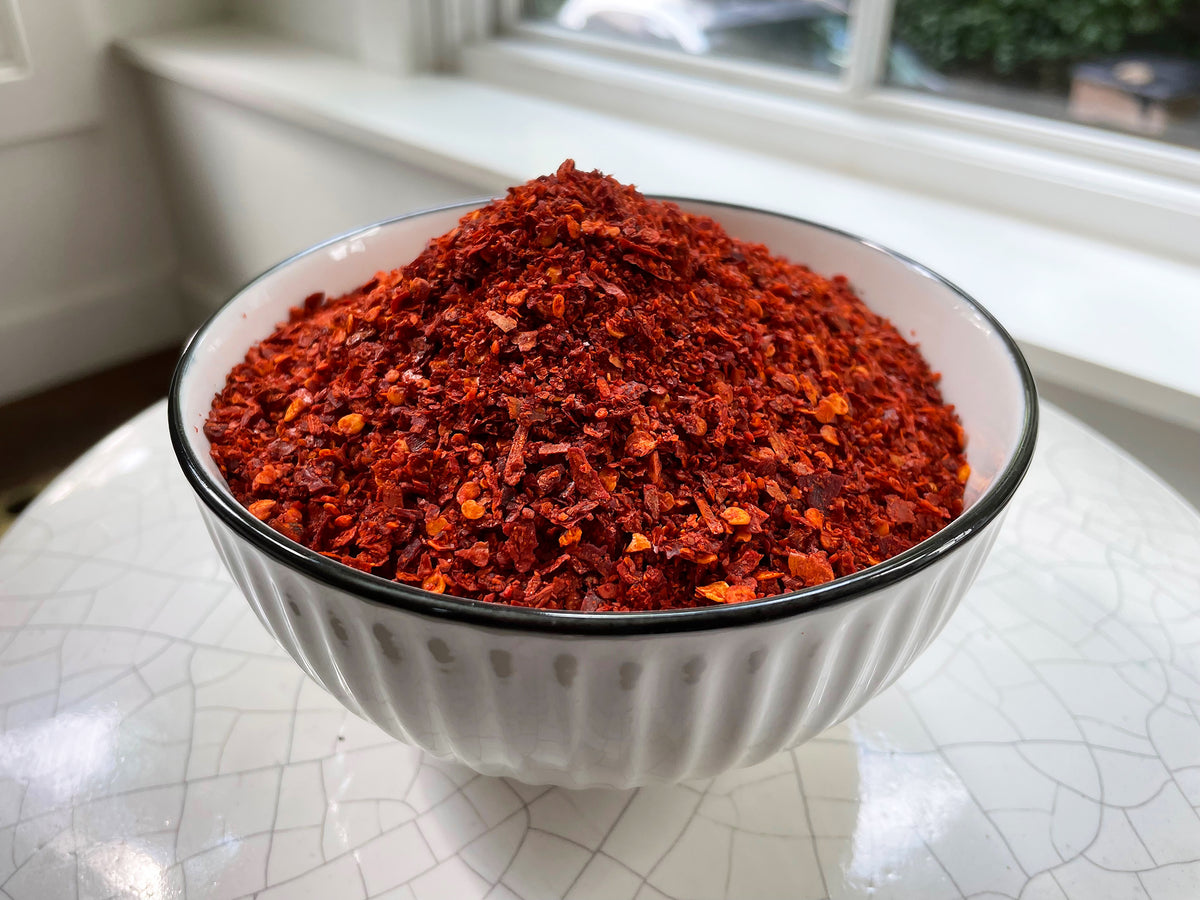 Ground chilies in a white bowl