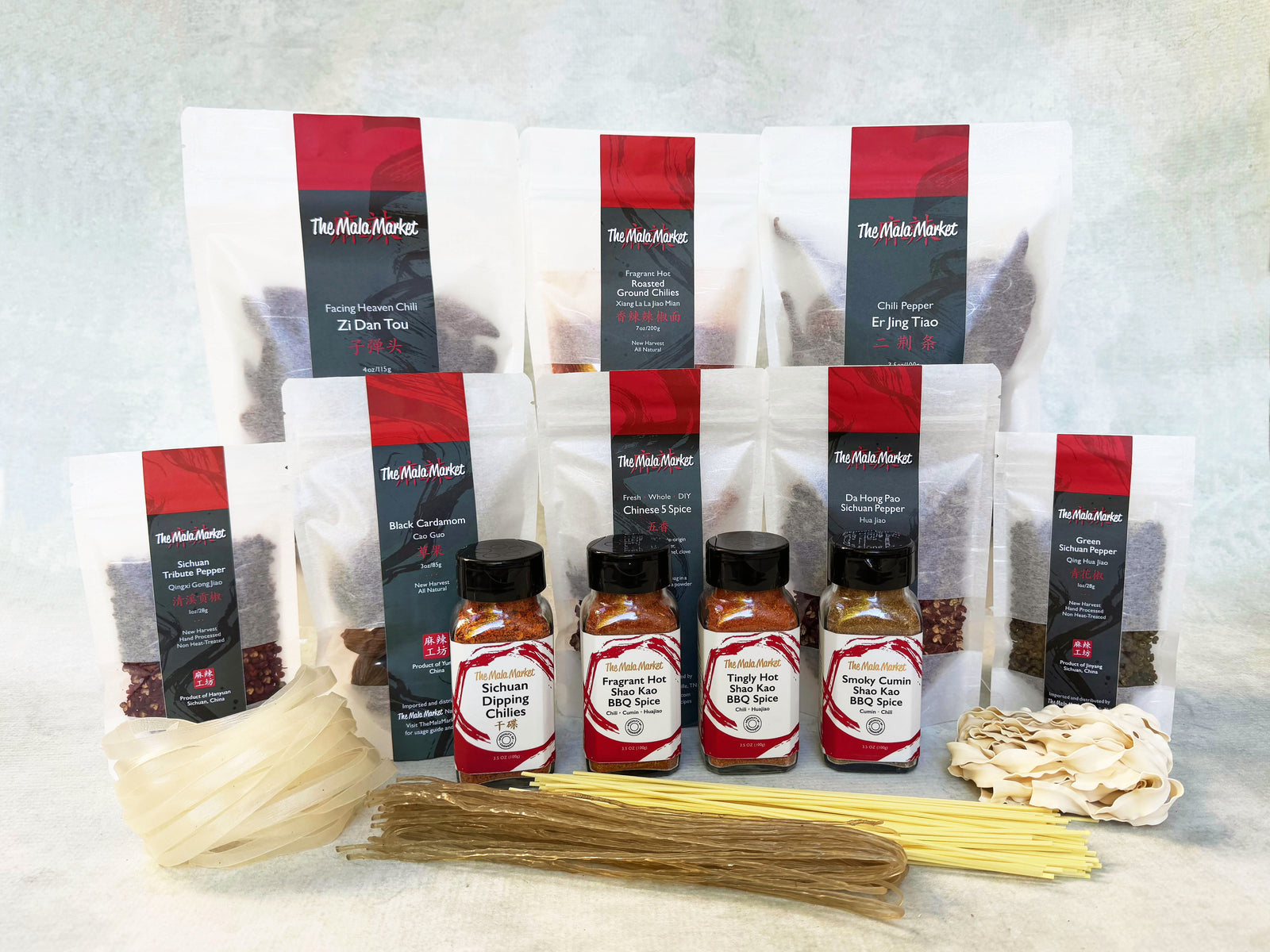 Packages of dried chilies, jars of spice blends and bundles of dried noodles