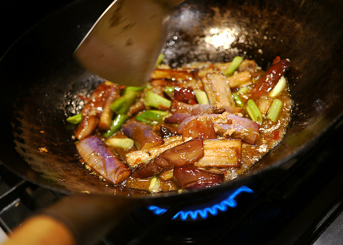 Yu xiang eggplant in a wok