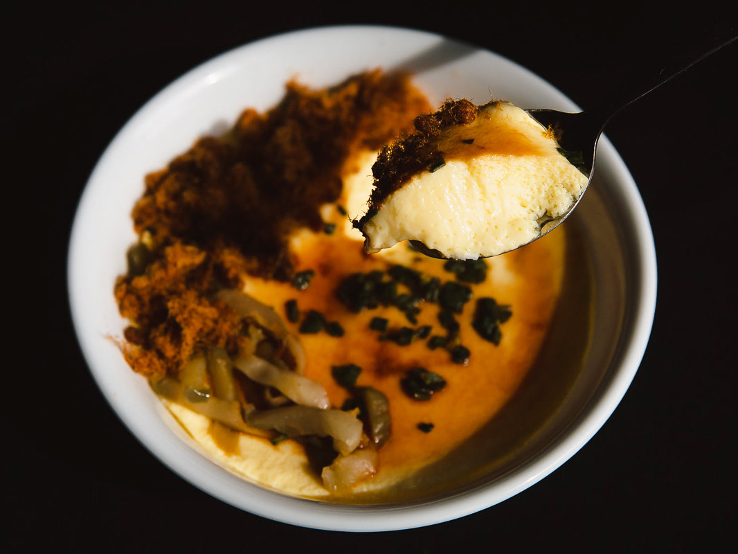 Chinese steamed egg topped with zhacai and pork floss