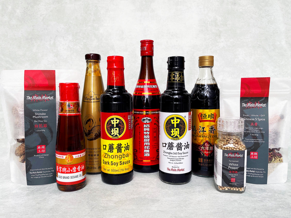 a collection of nine Chinese sauces and spices in bottles and bags