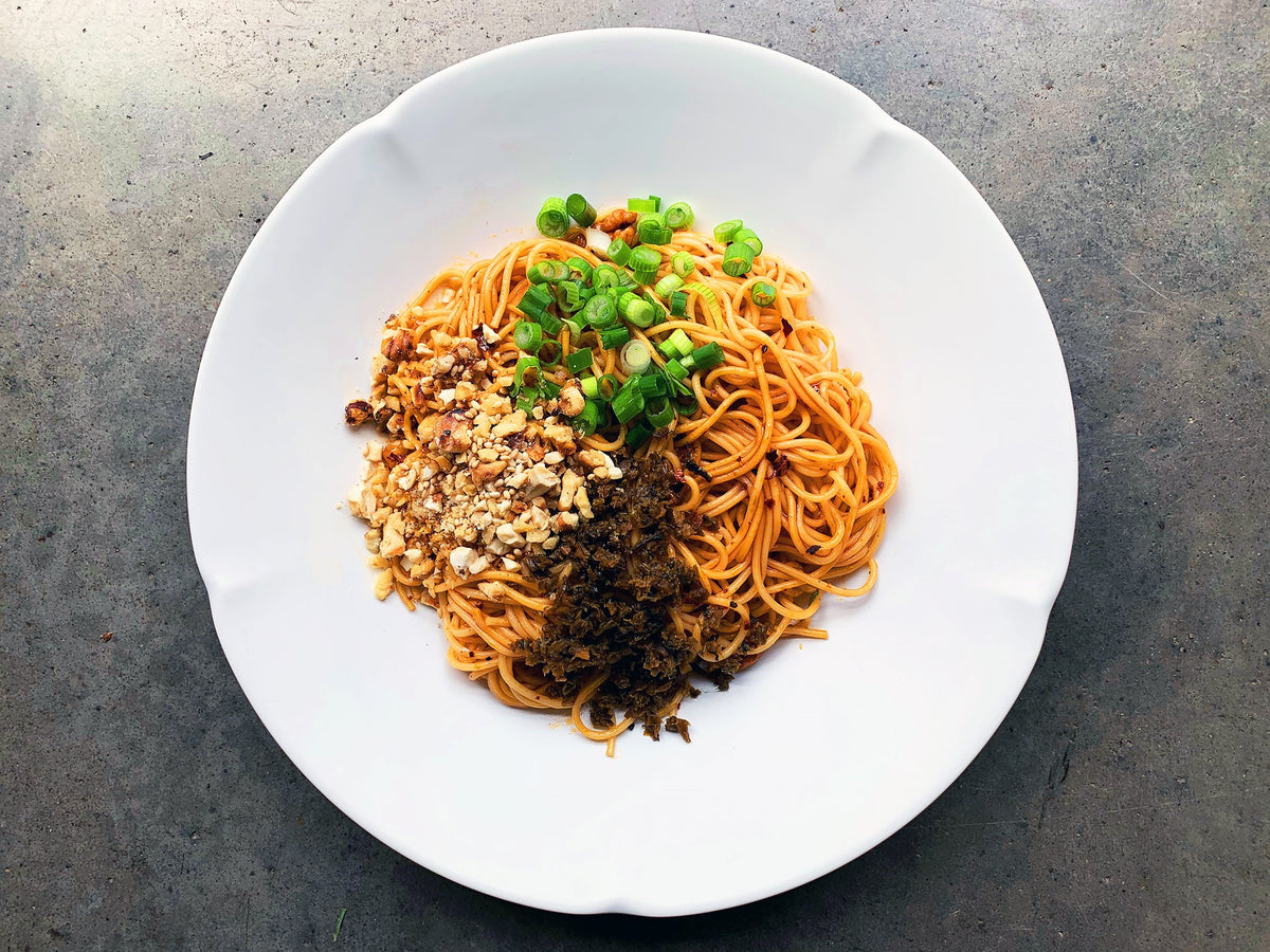 a bowl of Yibin ran mian with alkaline wheat noodles